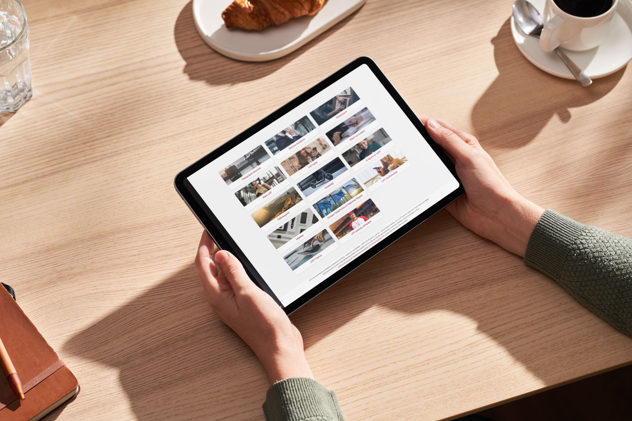 Person browsing an online course library on a tablet.